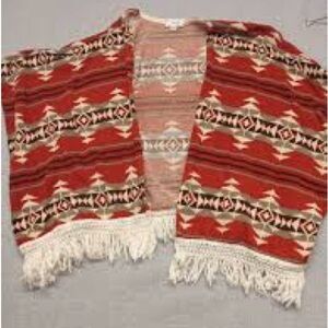 Anthropologie mauve poncho Aztec southwestern design on it like new size xl